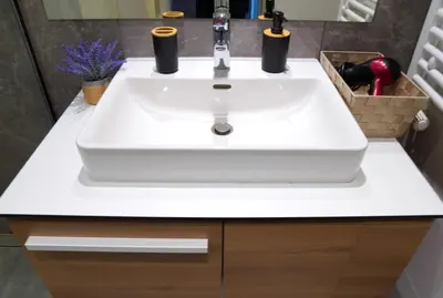 a bathroom with a white sink in a bathroom at Belgrade Waterfront Comfortable Apartment in Belgrade