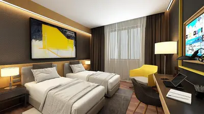 a hotel room with two beds and a desk and a tv at Maccani Black Luxury Suites in Belgrade