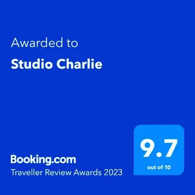 a blue screen with the text awarded to studio chirico certificate at Charlie Aviv Park in Belgrade