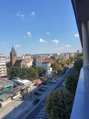 a view of a city street with cars on the road at Alexandar in Belgrade