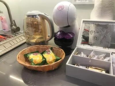 a kitchen counter with a basket of food and a blender at LIRRA LUXE - Central Belgrade Apartments in Belgrade