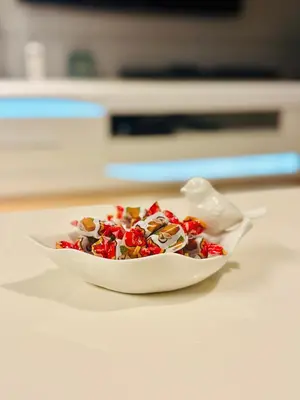 a bowl of food sitting on a table at SLAVNA - Luxe & Wine by the Fortress in Belgrade