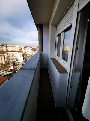 a balcony with a window in a building at Apartment Sovre in Belgrade