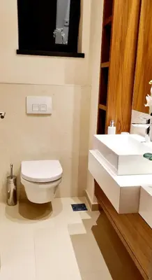 a bathroom with a toilet and a sink at Lux apartment in city center in Belgrade