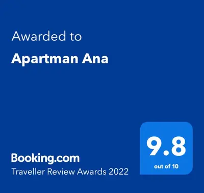 a screenshot of a phone with the text awarded to anarmian ama traveler at Apartman Ana in Dušanovac (historical)