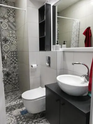 a bathroom with a white sink and a toilet at Sava river in Belgrade