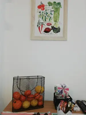 a basket of fruit and vegetables on a table at Sava river in Belgrade
