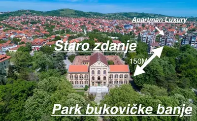 an aerial view of a large building in a city at Luxury Centar in Arandjelovac