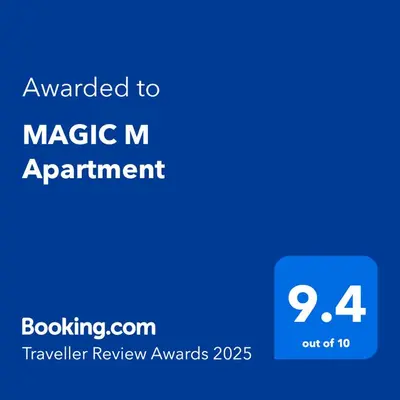 a blue sign with the text awarded to magic m appointment at MAGIC M Apartment in Mali Mokri Lug