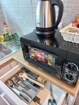 a coffeemaker sitting on top of a kitchen appliance at Apartments Balkanska City Center in Belgrade