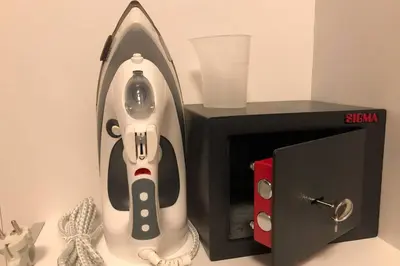 a video game controller is next to a box at Apartments Balkanska City Center in Belgrade