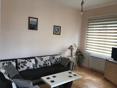 a living room with a couch and a table at STIV, Voždovac, Stepa Stepanovic in Voždovac