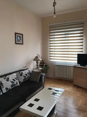 a living room with a couch and a coffee table at STIV, Voždovac, Stepa Stepanovic in Voždovac