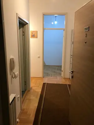 a hallway with a door open to a room at STIV, Voždovac, Stepa Stepanovic in Voždovac