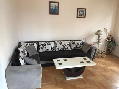 a living room with a couch and a table at STIV, Voždovac, Stepa Stepanovic in Voždovac