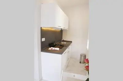 a kitchen with a sink and a counter top at ROCK - Studio with 30m2 terrace in Belgrade