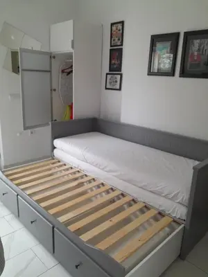 a bed in a room with a mirror at ROCK - Studio with 30m2 terrace in Belgrade