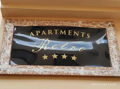 a sign for a restaurant with stars on it at Retro apartment in Zemun