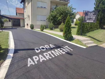a dont parking sign on a street in front of a house at Apartman DORA in Arandjelovac