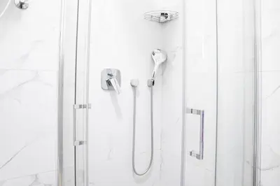 a shower in a bathroom with a glass door at Etoile City Center Apartments- Obilicev venac in Belgrade