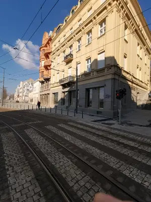 an empty street in front of a building at K43 Apartment in Belgrade