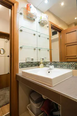 a bathroom with a sink and a mirror at BelArt apartment in Belgrade