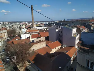 an overhead view of a city with red roofs at Apartment Africa in Belgrade