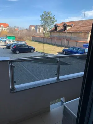 a view of a parking lot from a window at Royal Residence Apartmani in Pančevo