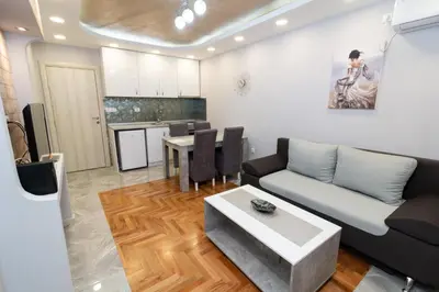 a living room with a couch and a table at New Belgrade Center 2 in Belgrade