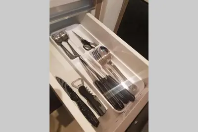 a drawer in a kitchen with utensils at Belgrade Waterfront Lux 2 in Belgrade