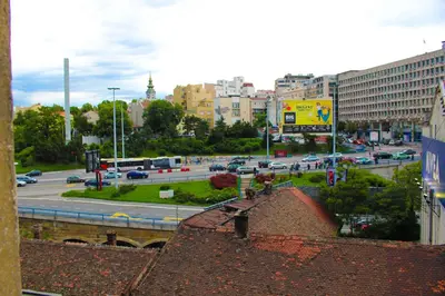 a view of a busy city with cars on a street at Comfortable apartment in city hub in Belgrade