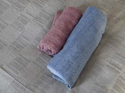 a brown and blue towel laying on the floor at Blue Apartment in Belgrade