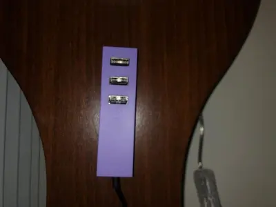 a purple electrical outlet on the side of a guitar at 1BR Flat in Heart Of Belgrade With Panoramic Central View in Belgrade