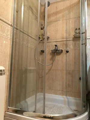 a shower with a glass door in a bathroom at 1BR Flat in Heart Of Belgrade With Panoramic Central View in Belgrade