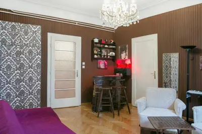 a living room with a couch and a bar at FABOULOUS apartment in Belgrade