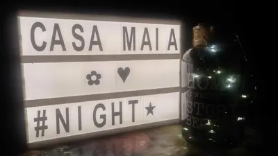 a bottle of csa malanca next to a bottle of wine at Kosmaj Casa Maia in Dučina