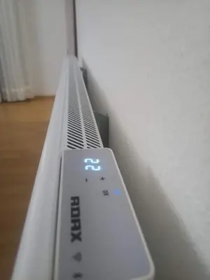 a white air conditioner in a room at Kosmaj Casa Maia in Dučina