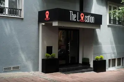 a building with a sign that reads the boutique at The Location Hotel in Belgrade