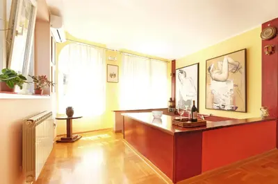 a large room with a desk and a window at Villa Tower Gardos in Belgrade