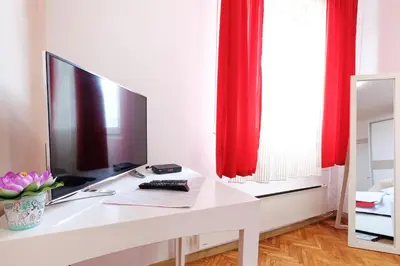 a white desk with a computer on top of it at Apartment Paradise Fantasy in Belgrade