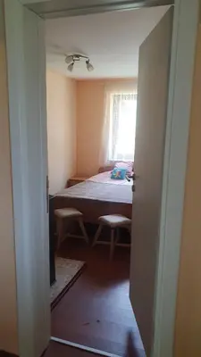 a bedroom with a bed in a room with a window at Vinogradski konak Belgrade, Sopot,Kosmaj in Sopot