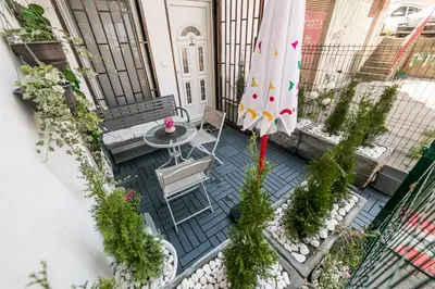 an overhead view of a patio with an umbrella at Gray Luxe in Belgrade
