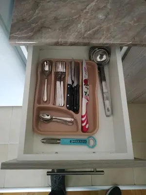 a tray with utensils sitting on a counter at SUMICE apartment in Belgrade