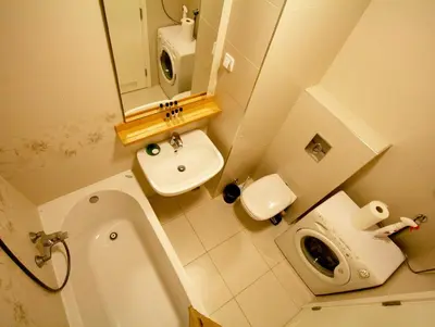 a small bathroom with a toilet and a sink at Apartment Moonstone 1 in Belgrade