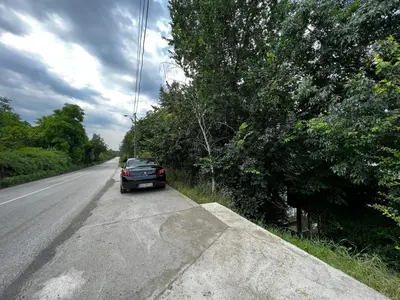 a car parked on the side of a road at Kuca i splav na reci Savi in Belgrade