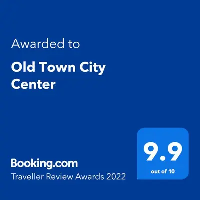 a blue sign that says upgraded to old town city center at Old Town City Center in Belgrade