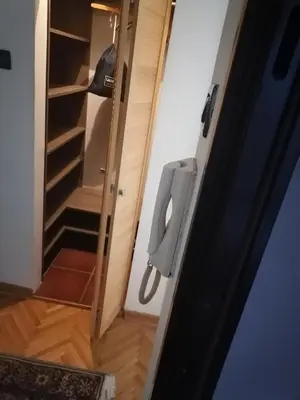 a door leading into a room with a closet at Andreja apartman 2 (jednosobni app -50m2) in Belgrade