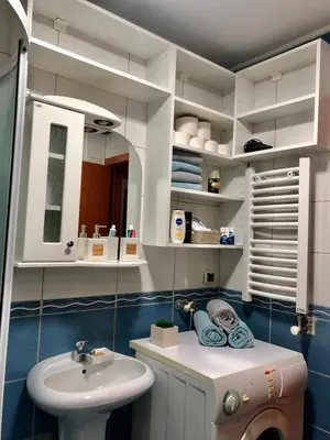a bathroom with a sink and a toilet at BellaVista Apartmani in Stara Pazova