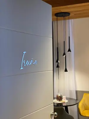 a room with a table and a sign that says linen at Luxury Apartments Donostia & Iruña in Belgrade