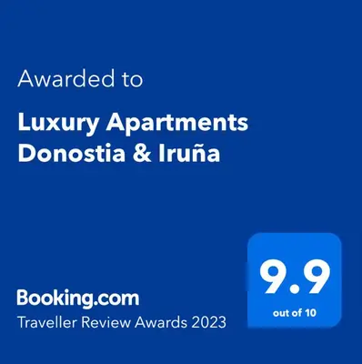 a blue sign with the text awarded to luxury apartments dominica and indiana at Luxury Apartments Donostia & Iruña in Belgrade